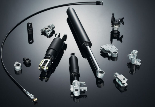 Surtido de resortes de gas Lockline, se muestran sus componentes y soportes de montaje de la gama de productos SUSPA.